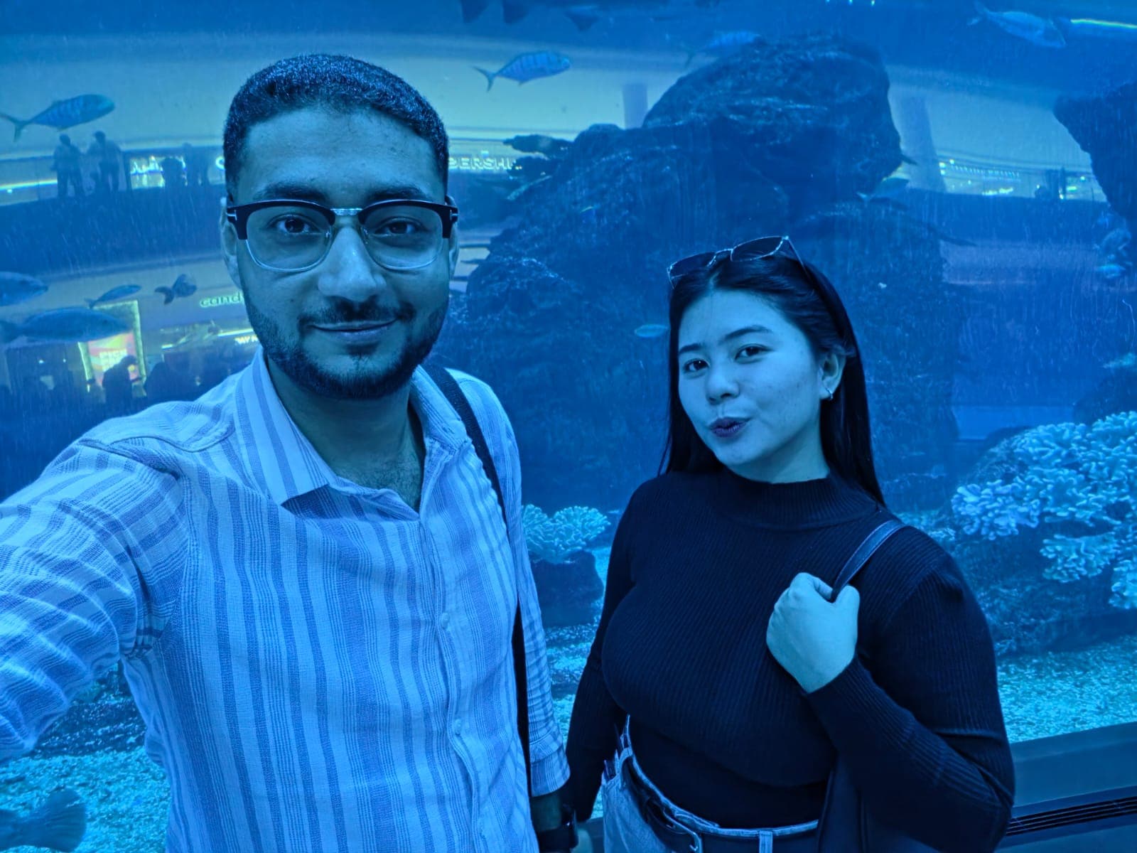 Kim blowing a kiss at the camera in our aquarium selfie
