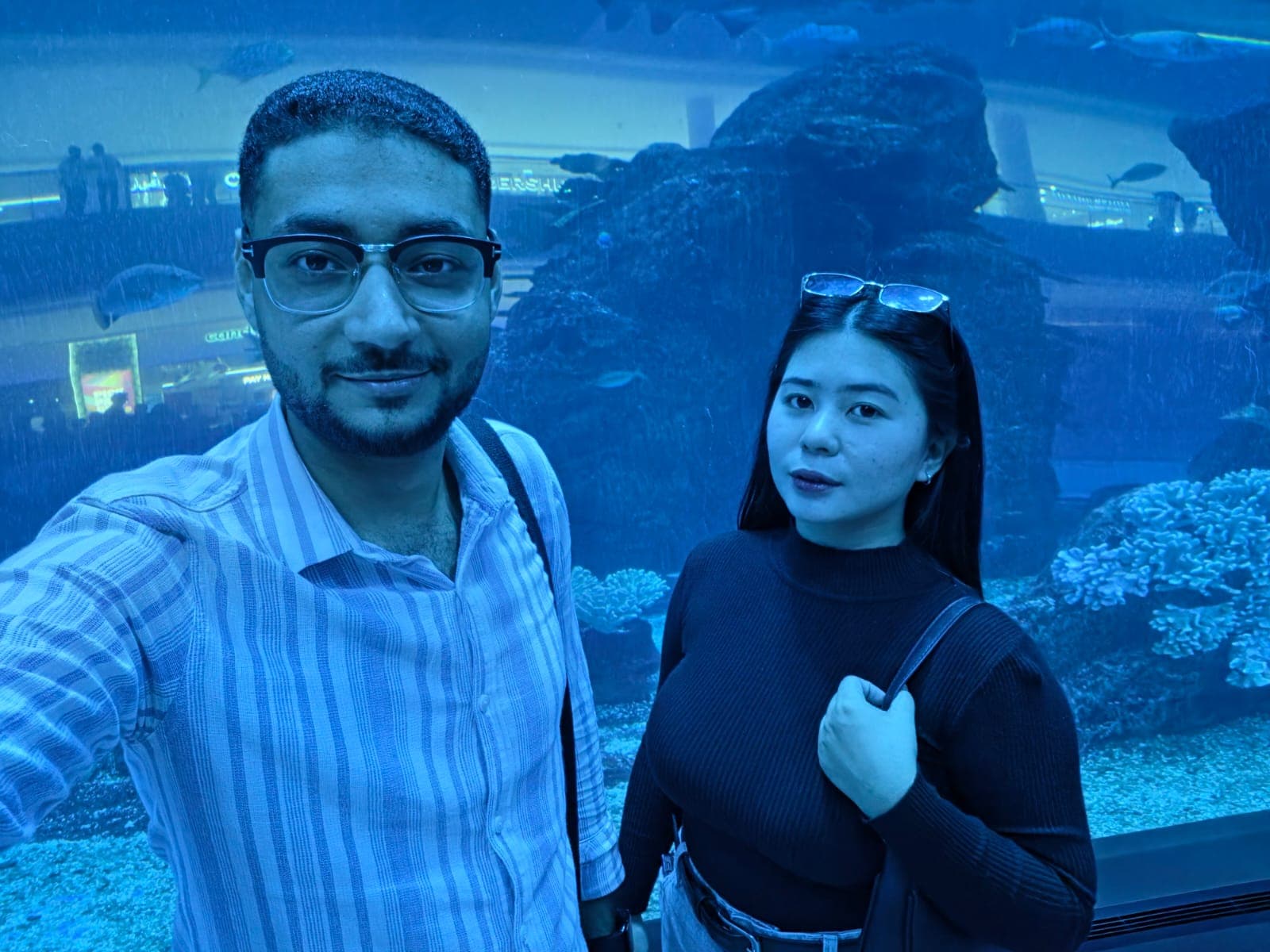 Kim and me taking a selfie in front of the aquarium tank