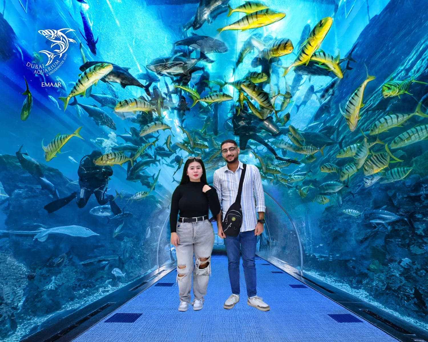 Kim and me in the aquarium’s souvenir photo, standing in a tunnel full of fish